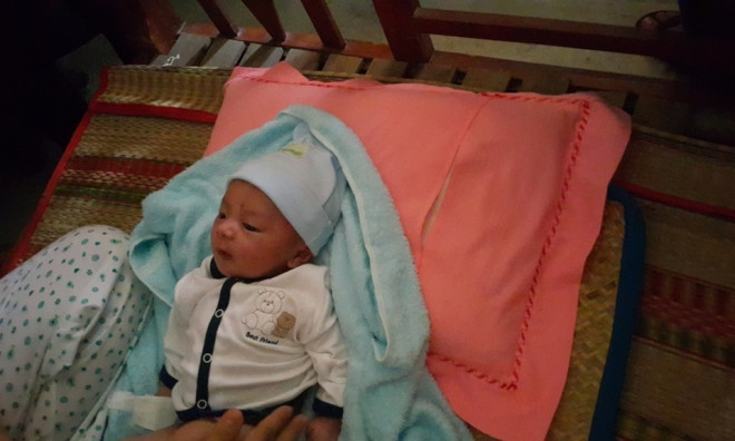 Bé Phát rất thích cười đùa khi được hỏi chuyện