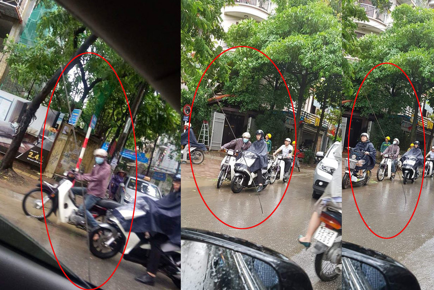 Thanh sắt rơi cắm thẳng xuống lòng đường. Ảnh Nguyễn Tiến Thành.