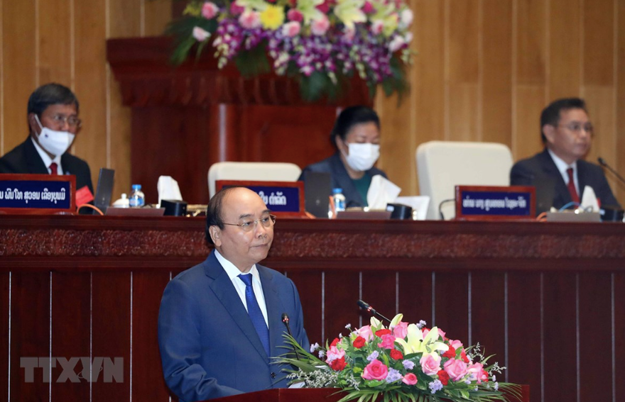 Chủ tịch nước Nguyễn Xuân Phúc phát biểu trước Quốc hội Lào sáng 10/8. (Ảnh: TTXVN)