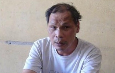 Ông Thách tại cơ quan công an. Ảnh báo Yên Bái