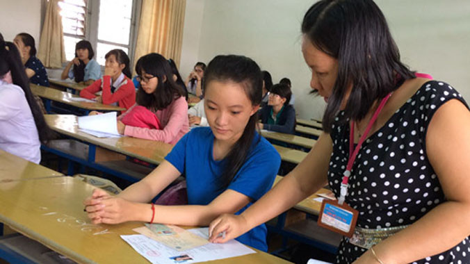 Thí sinh làm thủ tục dự thi tại Trường ĐH Sài Gòn năm 2014. Ảnh: Hà Ánh (Thanh Niên).