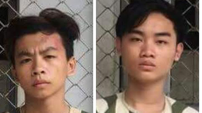 Hai nghi can Thiện và Long tại cơ quan điều tra. Ảnh CA cung cấp.