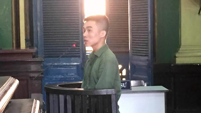 Bùi Công Bảo tại phiên tòa sáng 14/3. Ảnh: Tân Châu.