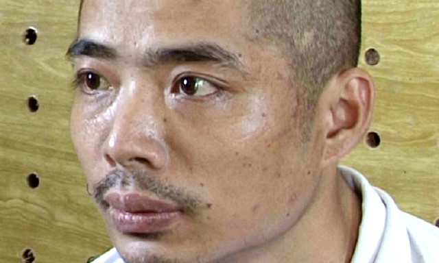 Đối tượng Nguyễn Viết Cường bị lực lượng công an bắt giữ. Ảnh: Báo Quảng Bình