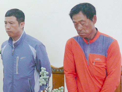 Nghi can Kim Jong Wook và Lee Jae Myeong thời điểm bị bắt. Ảnh: Văn Hùng