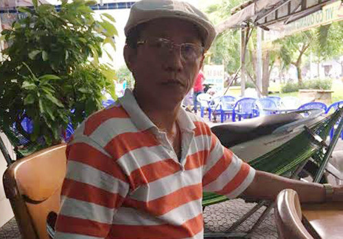 Ông Duy bị cảnh sát bắt. Ảnh: C.A.