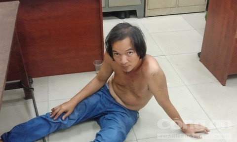 Đối tượng Lê Đức Minh tại cơ quan công an