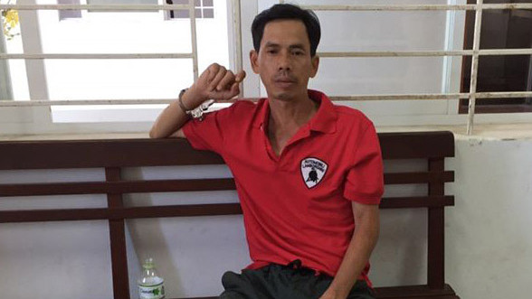 Nghi phạm Phong tại cơ quan công an