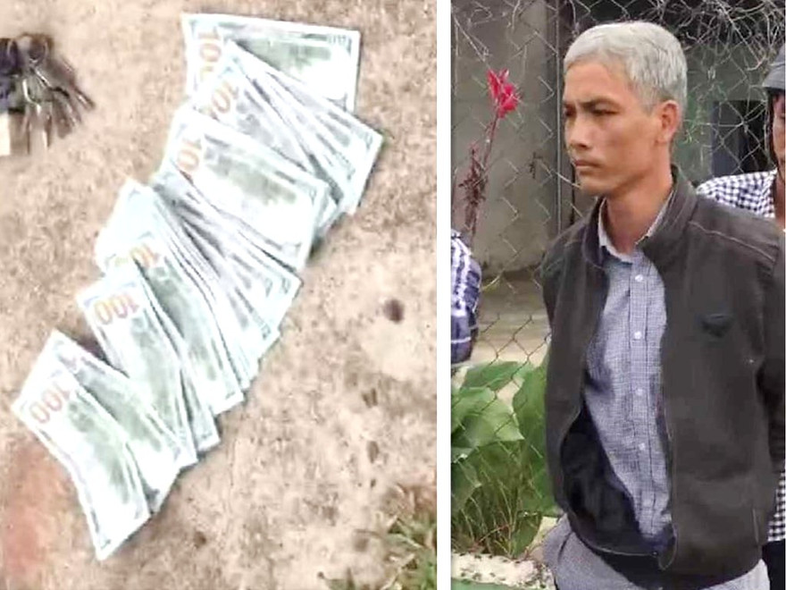 Ông Đặng Trường An cùng 2.500 USD tang vật. Ảnh: Tân Châu