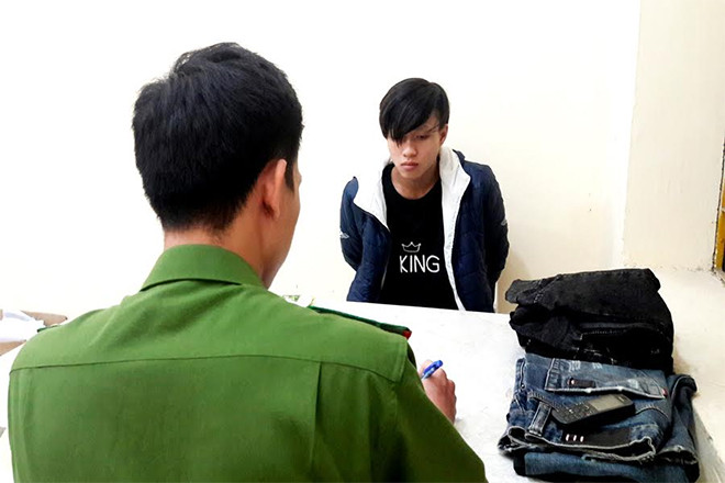 Đối tượng Nguyễn Quang Dũng tại cơ quan điều tra. 