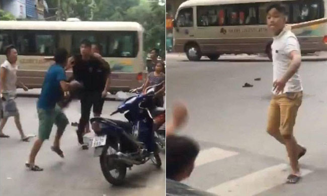 Hai nhóm côn đồ cầm hung khí truy sát nhau trên phố đi bộ. Ảnh chụp màn hình.