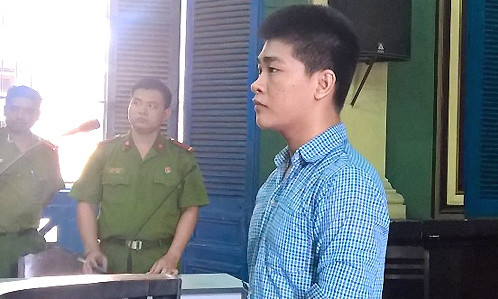 Bị cáo Nam bình thản nhận mức án cao nhất. Ảnh: Bình Nguyên. 