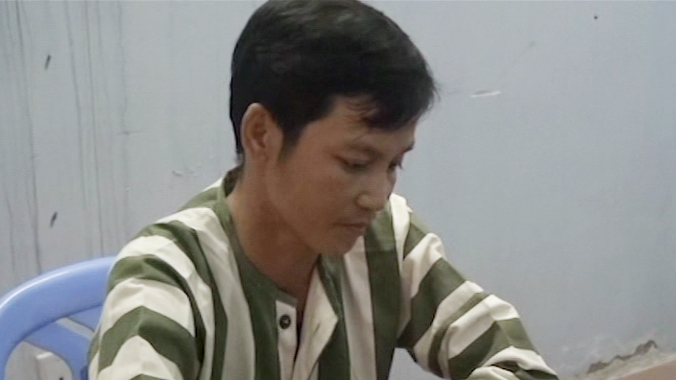 Nghi can Tiến tại cơ quan điều tra. Ảnh CA cung cấp.