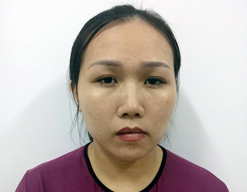 Nghi phạm Tuyền tại cơ quan công an