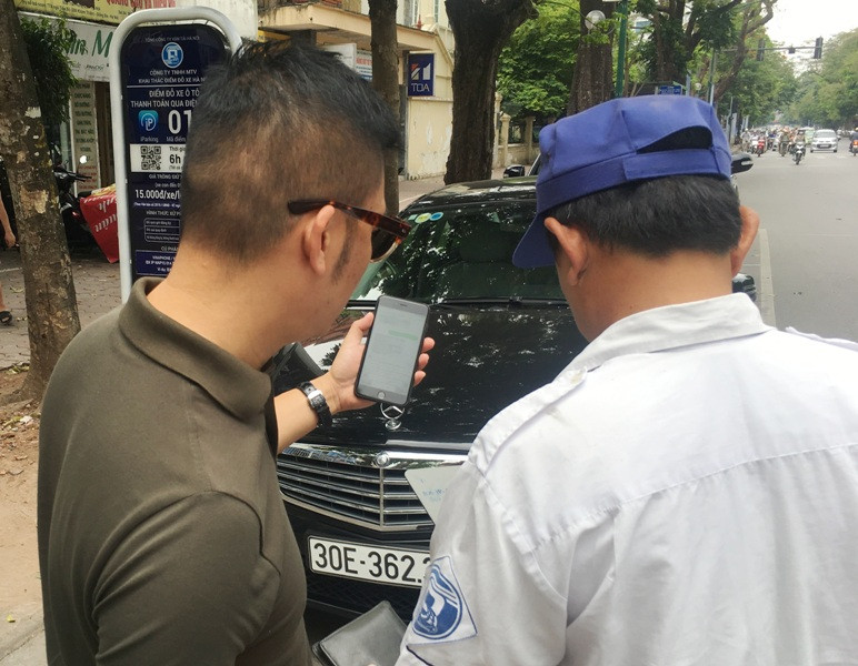 Chấp nhận thanh toán bằng cả tin nhắn và tiền mặt để mở lỗi thoát cho đỗ xe iParking