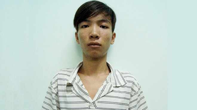 Hung thủ Đỗ Văn Chinh tại cơ quan điều tra