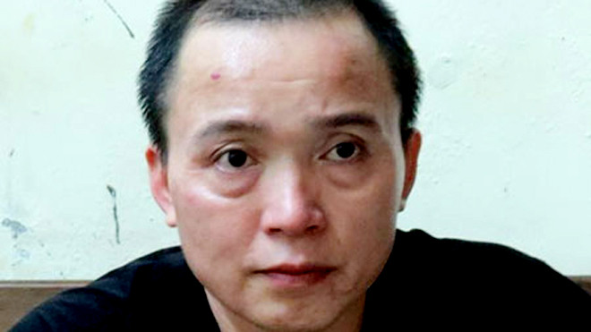 Nguyễn Thanh Sơn tại cơ quan công an - Ảnh :Toàn 