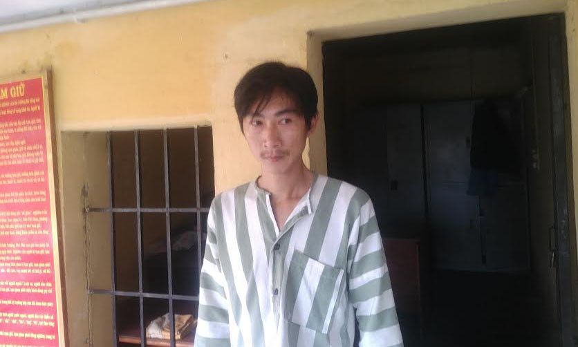 Đối tượng Võ Ái Quốc tại cơ quan công an. Ảnh: CA cung cấp.