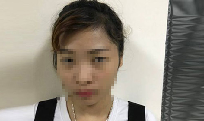 H. tại cơ quan công an. Ảnh: Đ. Tuấn.