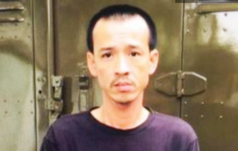 Nghi can Huân tại cơ quan công an.