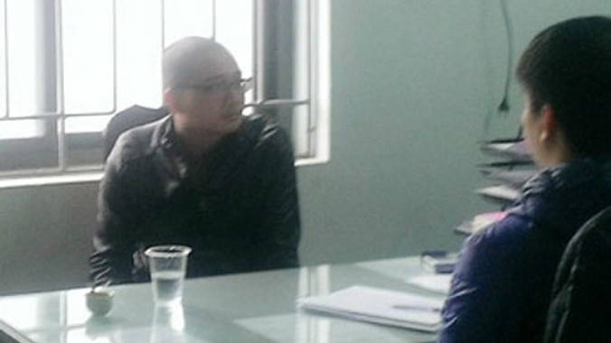 Cao Xuân Quát tại cơ quan Công an.