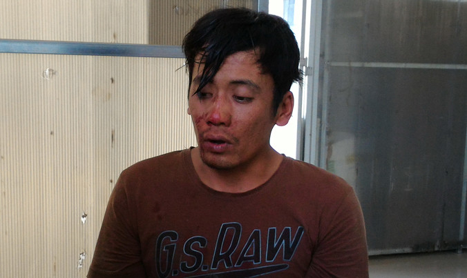 Nguyễn Anh Tú tại cơ quan công an.