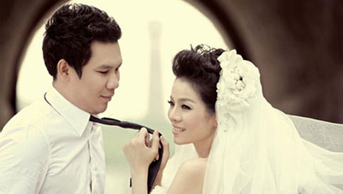 Vợ chồng ca sĩ Lệ Quyên- Đức Huy.