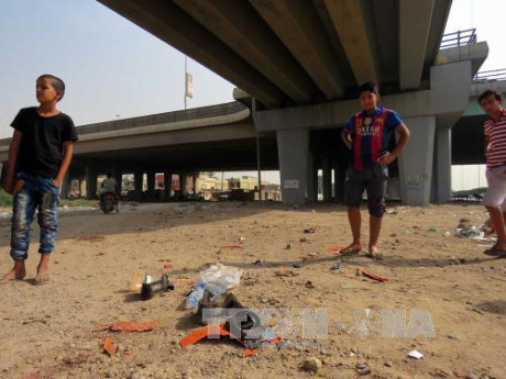 Hiện trường một vụ đánh bom ở Baghdad. 