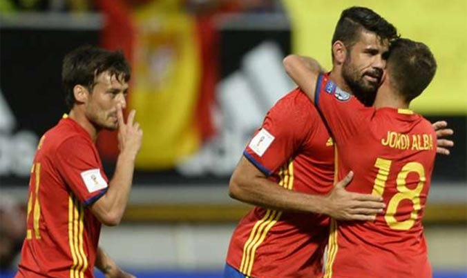 Silva (trái) và Costa (giữa) đều có cú đúp. Ảnh: Reuters.