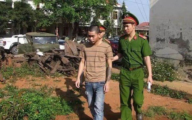 Cơ quan công an dẫn giải Đỗ Ngọc Trường Xuân