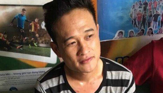 Đặng Quốc Ánh tại cơ quan công an.