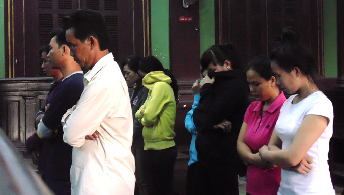 Các bị cáo tại phiên tòa phúc thẩm chiều 26/2, Ảnh: Tân Châu.