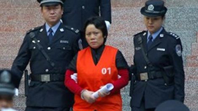 Xie Caiping sa lưới.