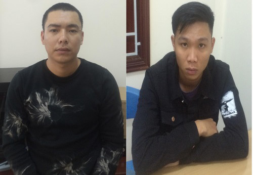 Hoàn và Phát tại cơ quan điều tra. Ảnh: Công an cung cấp