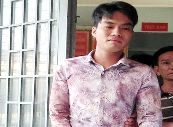 Nguyễn Minh Tài đến cơ quan công an đầu thú