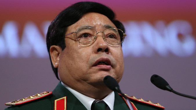 Bộ trưởng Quốc phòng Phùng Quang Thanh. Ảnh: How Hwee Young, EPA.