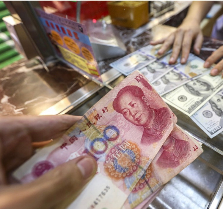 Động thái hạ giá đồng nhân dân tệ của Trung Quốc được cho là nhằm trả đũa việc Mỹ sắp tăng thuế tiếp lên hàng nhập khẩu từ Trung Quốc. (Ảnh: SCMP)