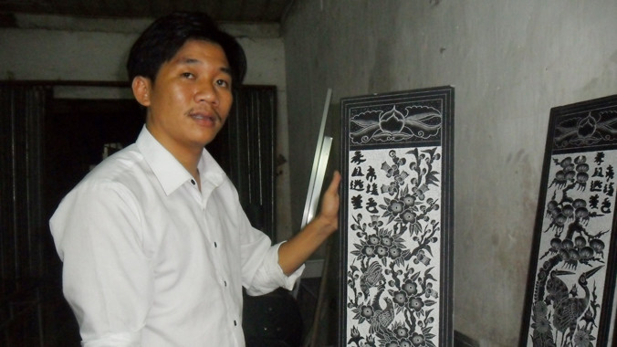 Anh Trần Văn Sùng tại Công ty TNHH xây dựng Tuấn Thành do anh gây dựng. Ảnh: Phạm Nhài 