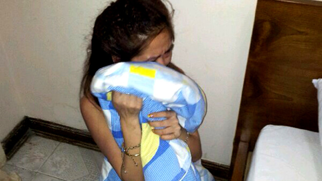 Nữ tiếp viên bán dâm trong khách sạn. Ảnh: Quốc Thắng