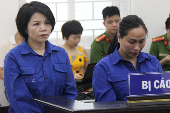 Bị cáo Vững, Vân tại phiên tòa.