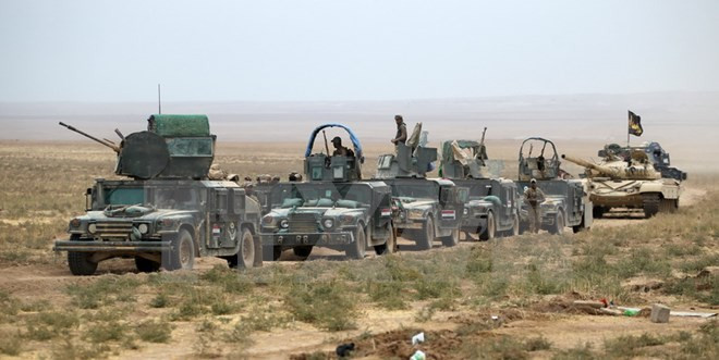 Binh sỹ Iraq tham gia chiến dịch truy quét IS đóng quân ở khu vực al-Shura, phía nam Mosul ngày 28/10. Nguồn: AFP/TTXVN