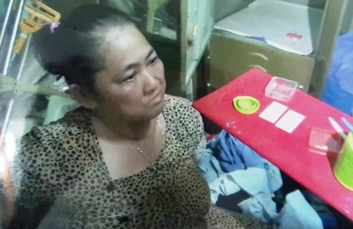 Bị can Nguyễn Thị Ngọc Lan bị công an bắt giữ. Ảnh CA cung cấp.