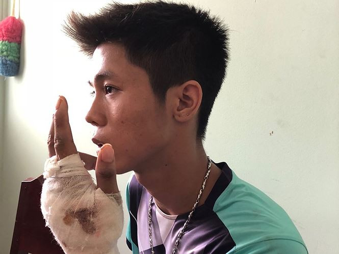 Nguyễn Hữu Tình tại cơ quan công an. Ảnh: CA