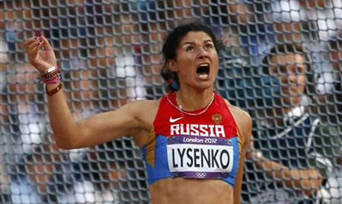 Tatyana Lysenko ăn mừng chức vô địch ném tạ nữ tại Olympic 2012. Ảnh: Reuters.