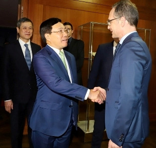 Phó Thủ tướng Phạm Bình Minh và Bộ trưởng Ngoại giao Đức Heiko Maas. (Ảnh: BNG)