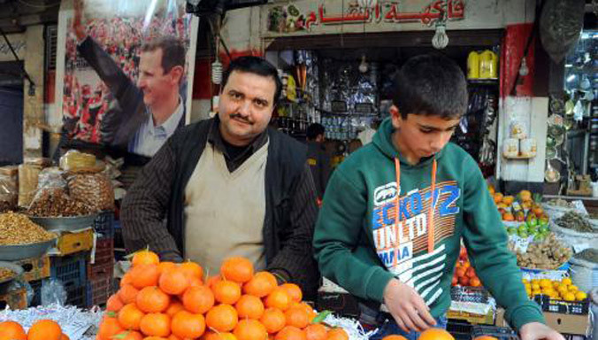 Người dân Syria trở lại hoạt động thường nhật tại Damascus ngày 27/2, sau khi lệnh ngừng bắn có hiệu lực. Ảnh: THX/TTXVN.