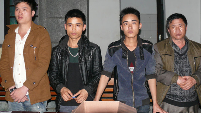 Các đối tượng đưa người vượt biên trái phép tại cơ quan điều tra.