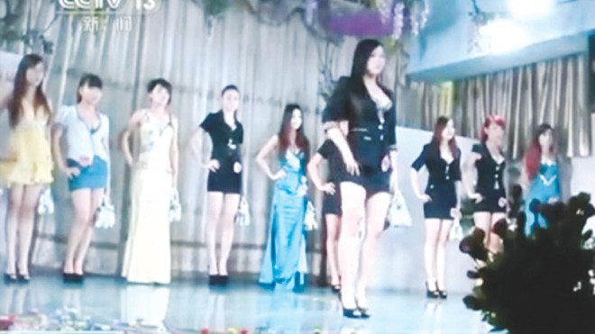 Một số gái bán dâm bị ghi hình trong clip của CCTV. Ảnh: SCMP