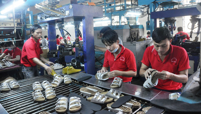 Mức thưởng Tết Bính Thân năm 2016 cao nhất là 600 triệu đồng/người, thấp nhất là 3.088 triệu đồng/người. Ảnh Việt Văn.