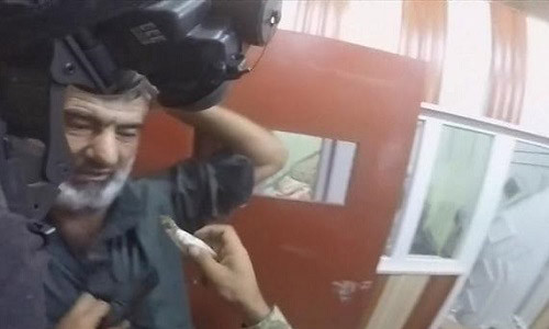 Hình ảnh về cuộc đột kích nhà tù được truyền hình Iraq phát sóng. Ảnh: Reuters.